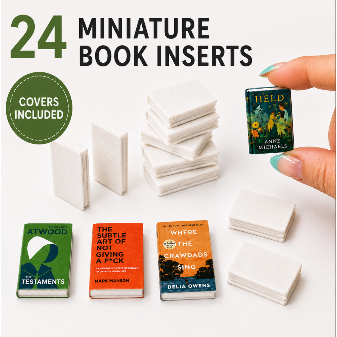 24 miniature book inserts shown on a white background, including stacks of blank white book covers and a few sample books with printed covers. A hand with teal nail polish holds one miniature book titled 'Held' by Anne Michaels.